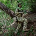 A rifleman from B Co., 4-9IN maneuvers up a steep slope at Camp Casey Training Area, South Korea July 29, 2025