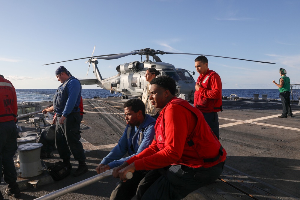 Sailors aboard the USS John Finn conduct flight quarters in the Indian Ocean