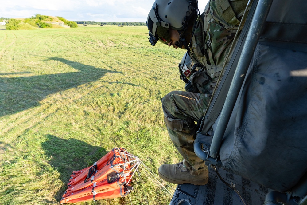 Black Hawks Train for Aerial Firefighting Support During Gunnery Operations