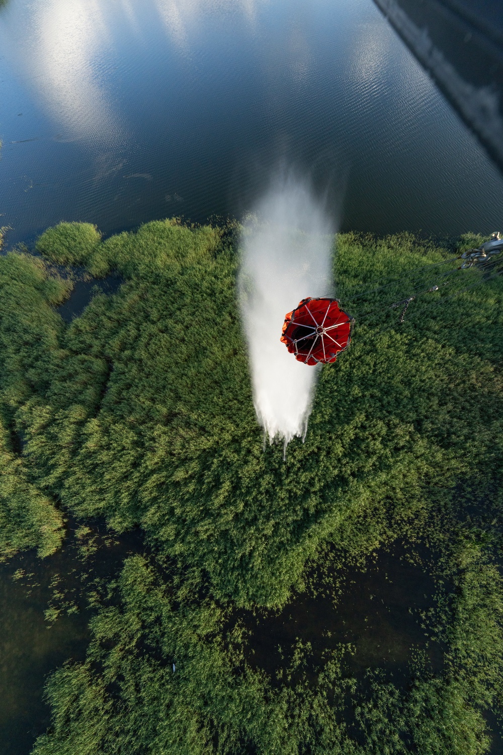 Black Hawks Train for Aerial Firefighting Support During Gunnery Operations