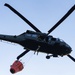Black Hawks Train for Aerial Firefighting Support During Gunnery Operations