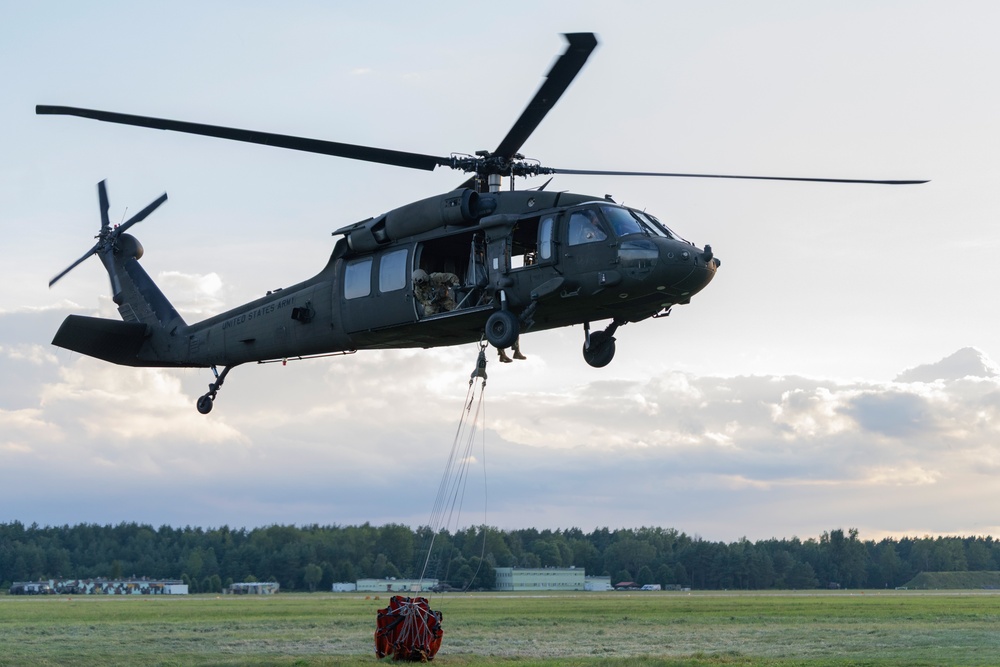 Black Hawks Train for Aerial Firefighting Support During Gunnery Operations