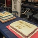 Sailors aboard the USS John Finn hold a birthday celebration on the messdecks in Diego Garcia