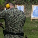 Sailors assigned to the USS John Finn conduct a small arms gun shoot in Diego Garcia