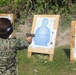 Sailors assigned to the USS John Finn conduct a small arms gun shoot in Diego Garcia