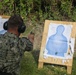 Sailors assigned to the USS John Finn conduct a small arms gun shoot in Diego Garcia