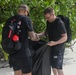 Sailors assigned to the USS John Finn conduct a beach cleanup in Diego Garcia
