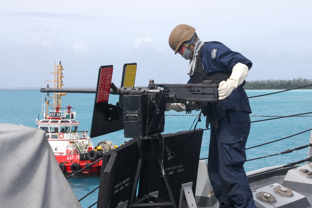 Sailors aboard the USS John Finn conduct a sea and anchor detail in Diego Garcia