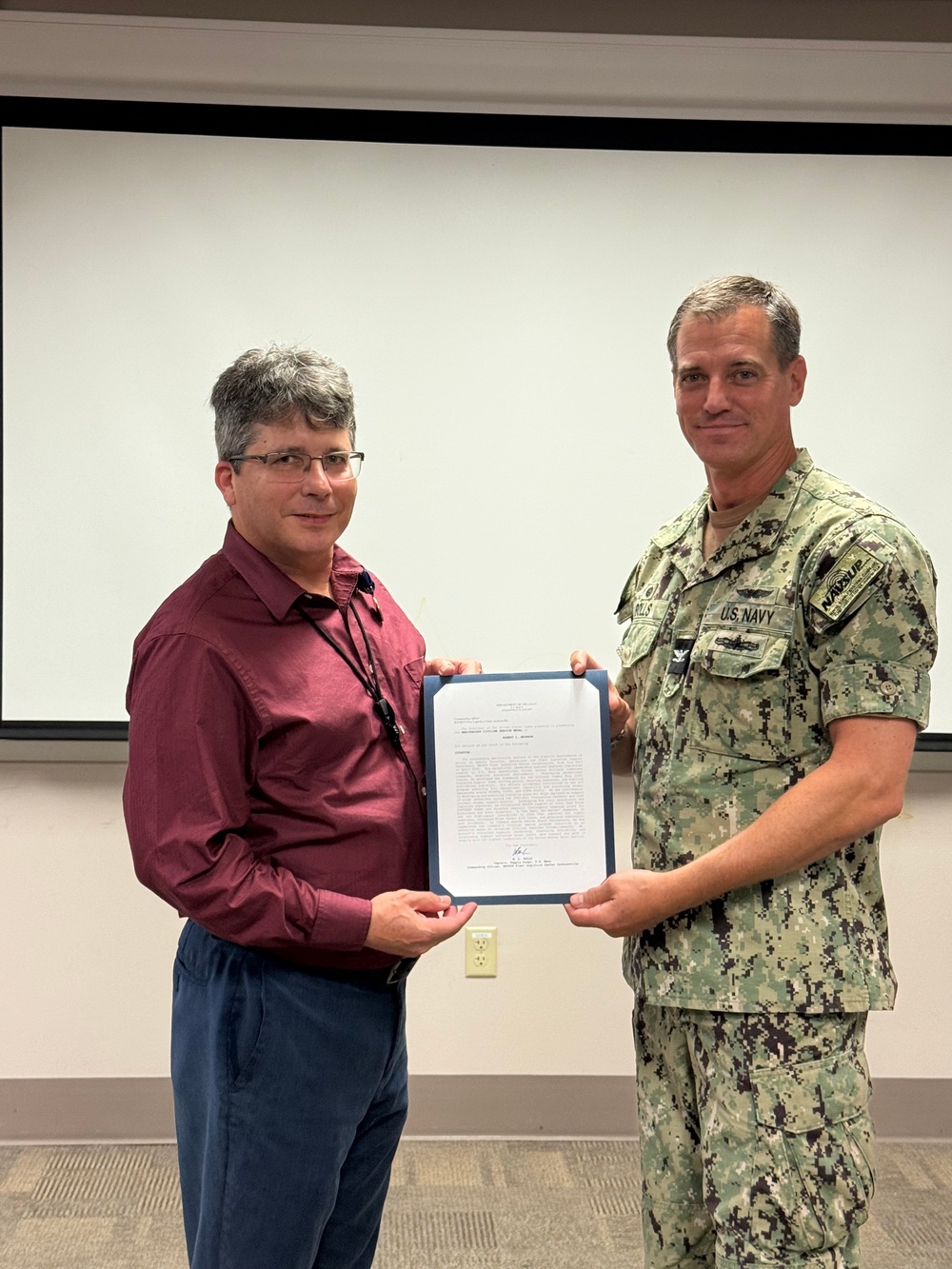 Robert Brunson receives the Meritorious Civilian Service Award