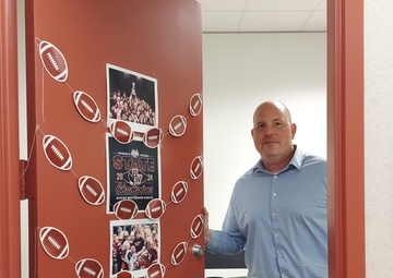 Strong work ethic sustains record-breaking season for Watterson head football coach, DLA division chief