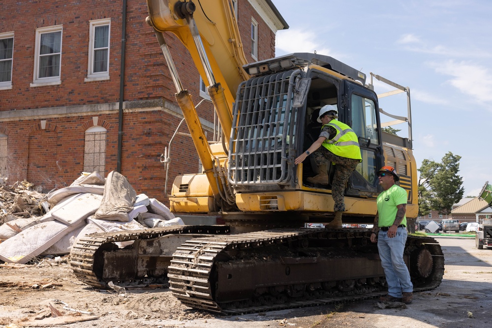 Col. Colegate assists in Robinson Hall demolition