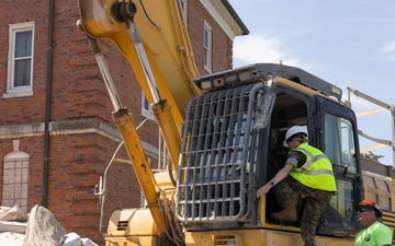 Col. Colegate assists in Robinson Hall demolition