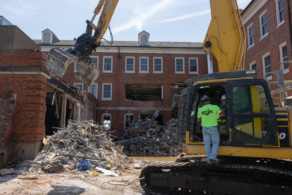Col. Colegate assists in Robinson Hall demolition
