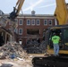Col. Colegate assists in Robinson Hall demolition