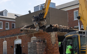 Col. Colegate assists in Robinson Hall demolition