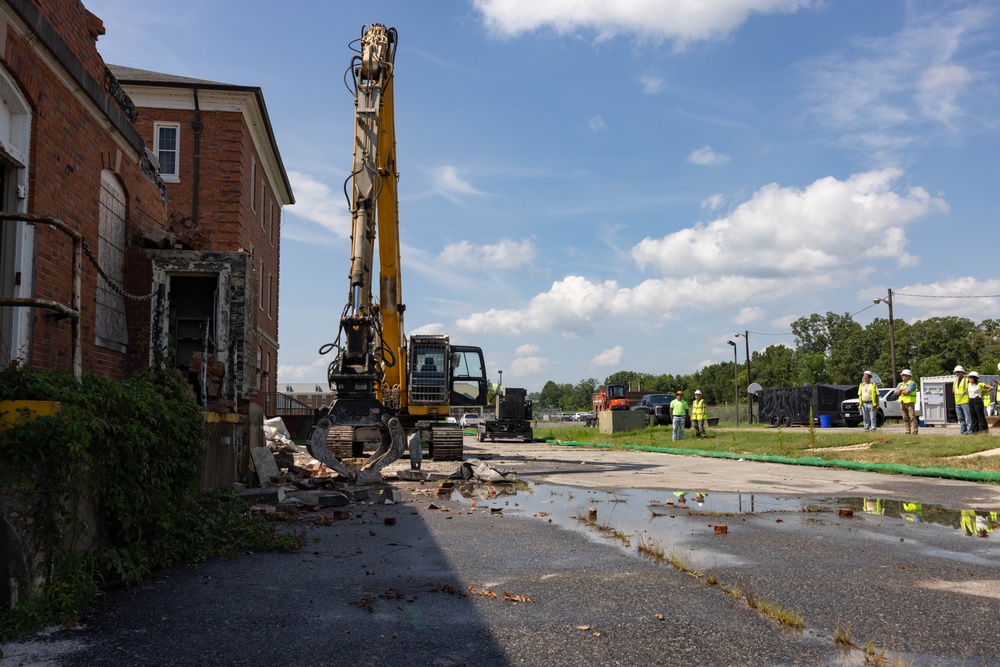 Col. Colegate assists in Robinson Hall demolition