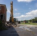 Col. Colegate assists in Robinson Hall demolition