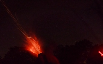 White Devils fire mortars at night during Devil Avalanche