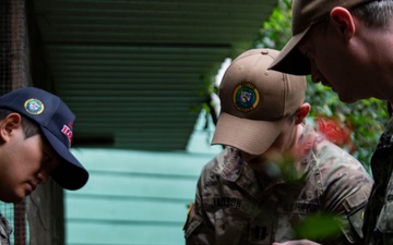 Pacific Partnership 2025 Multinational Servicemembers Discuss Animal Welfare during an engagement at the Rainforest Habitat.