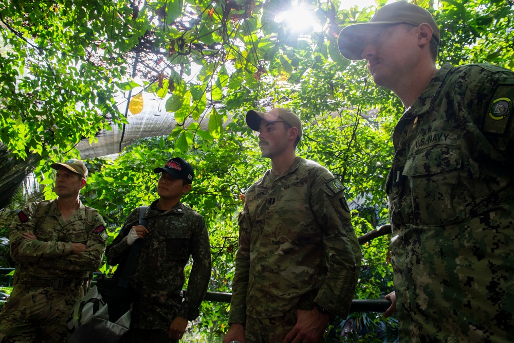 Pacific Partnership 2025 Multinational Servicemembers Discuss Animal Welfare during an engagement at the Rainforest Habitat.