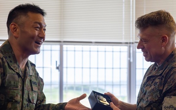 Japan Ground Self-Defense Force presents certificate of appreciation to U.S. Marine Corps 3D Marine Expeditionary Brigade commanding general