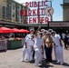Sailors and Marines tour Pike Place Market during Seattle Fleet Week 2025