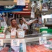 Sailors and Marines tour Pike Place Market during Seattle Fleet Week 2025