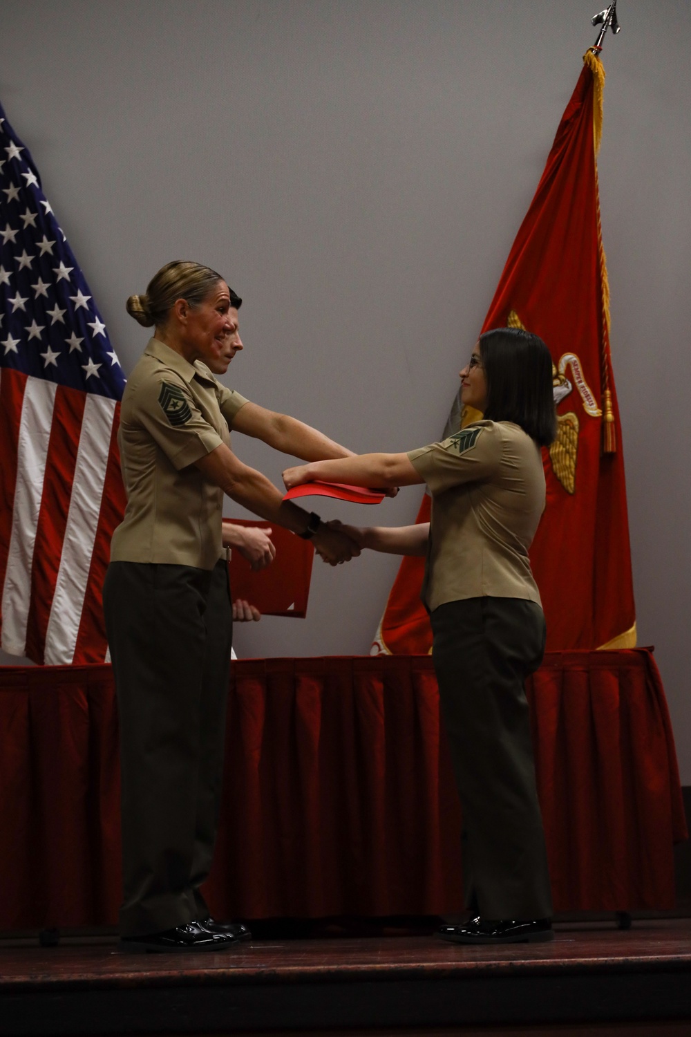 U.S. Marines with MAG-24 graduate from Sergeants Course 7-25