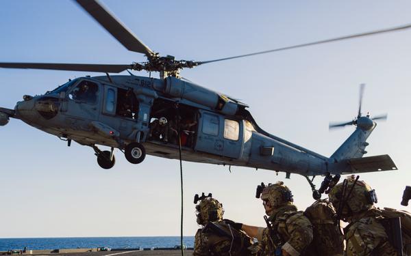 EODMU 5 and HSC-12 Conduct Fast-rope Exercises with USNS Alan Shepard