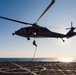 EODMU 5 and HSC-12 Conduct Fast-rope Exercises with USNS Alan Shepard