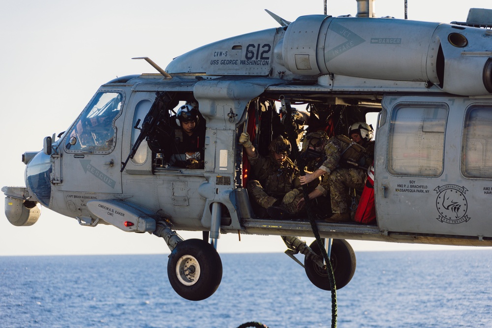 EODMU 5 and HSC-12 Conduct Fast-rope Exercises with USNS Alan Shepard