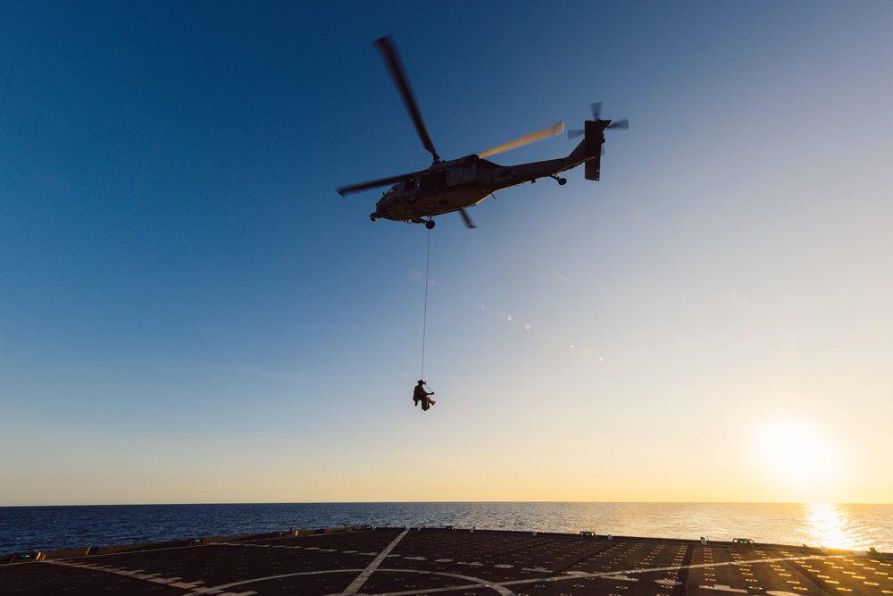EODMU 5 and HSC-12 Conduct Fast-rope Exercises with USNS Alan Shepard