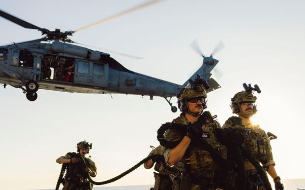 EODMU 5 and HSC-12 Conduct Fast-rope Exercises with USNS Alan Shepard