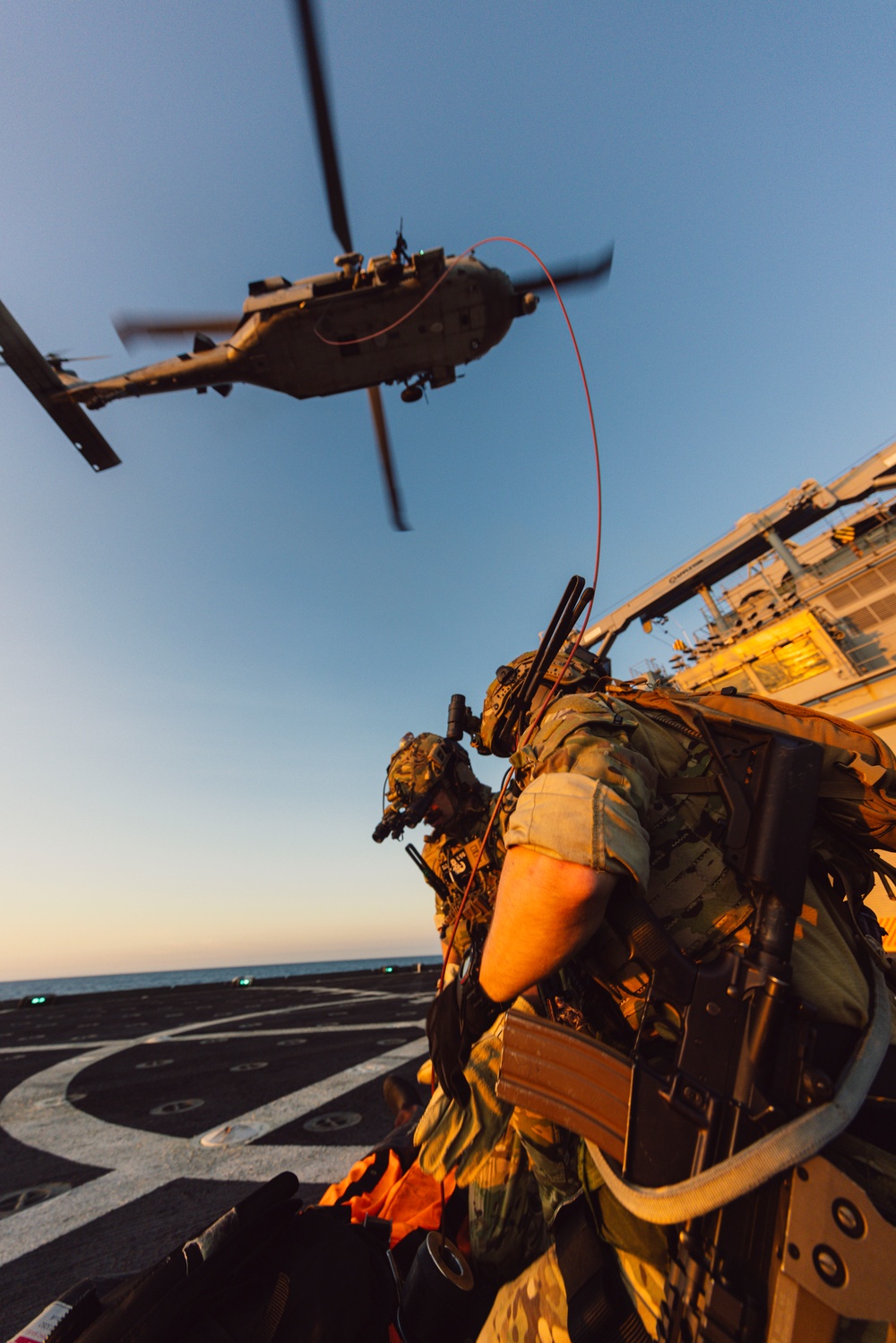 EODMU 5 and HSC-12 Conduct Fast-rope Exercises with USNS Alan Shepard