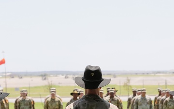 1st Air Cavalry Brigade HHC say farewell to Capt. Jonathan Pompey and welcome incoming commander, Capt. Haley Custer