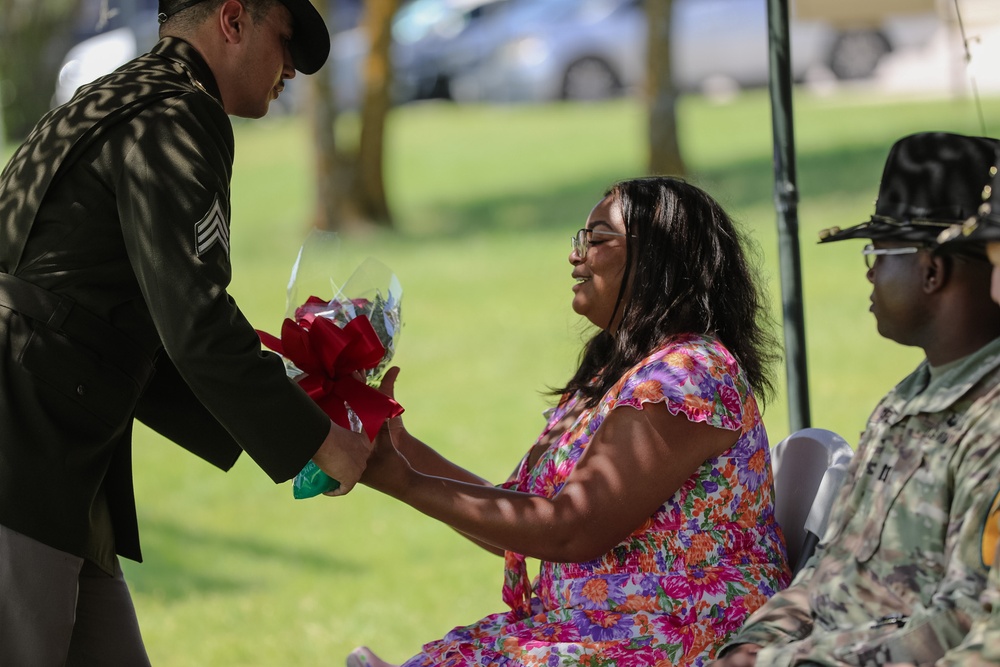 1st Air Cavalry Brigade HHC say farewell to Capt. Jonathan Pompey and welcome incoming commander, Capt. Haley Custer