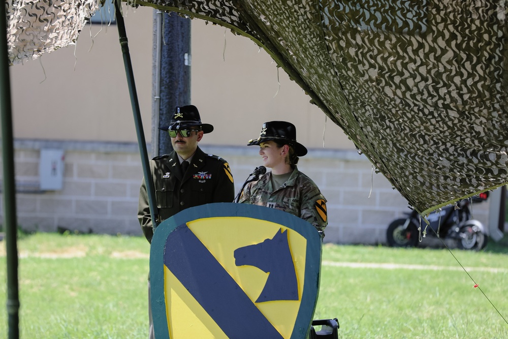 1st Air Cavalry Brigade HHC say farewell to Capt. Jonathan Pompey and welcome incoming commander, Capt. Haley Custer