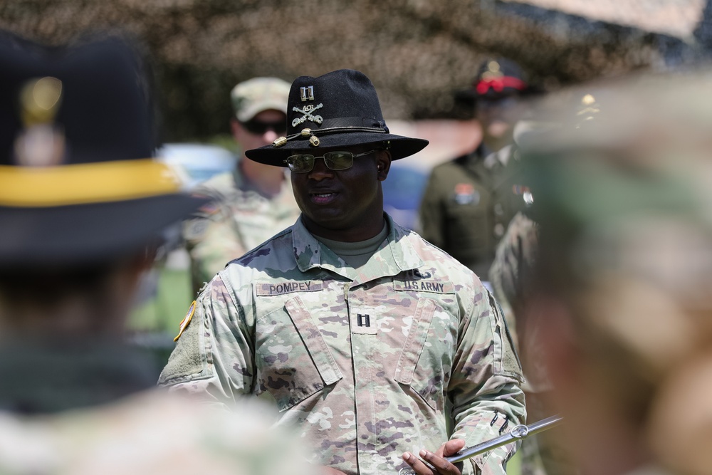 1st Air Cavalry Brigade HHC say farewell to Capt. Jonathan Pompey and welcome incoming commander, Capt. Haley Custer