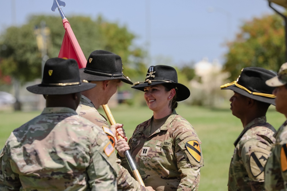 1st Air Cavalry Brigade HHC say farewell to Capt. Jonathan Pompey and welcome incoming commander, Capt. Haley Custer