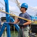 Navy Divers Repair USS Iwo Jima