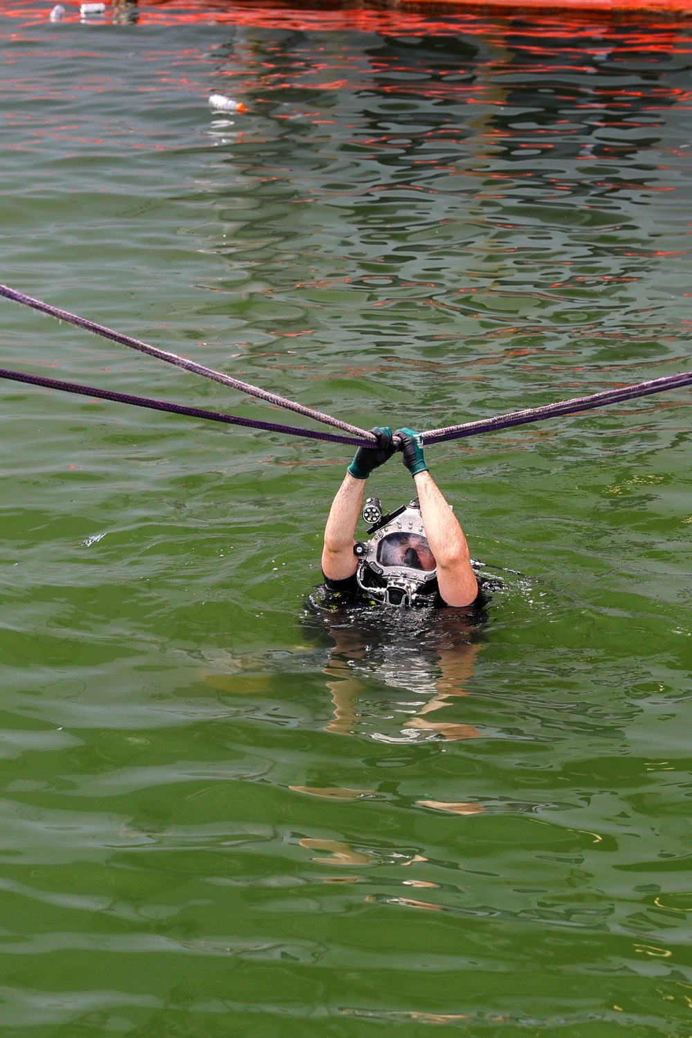 Navy Divers Repair USS Iwo Jima
