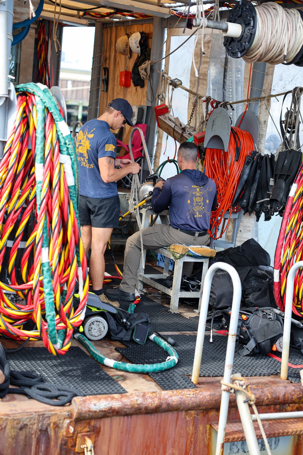 Navy Divers Repair USS Iwo Jima