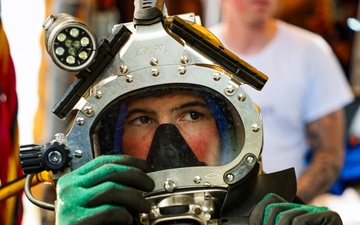 Navy Divers Repair USS Iwo Jima