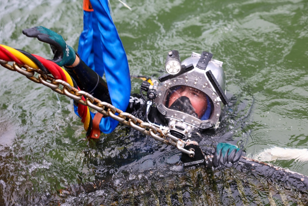 Navy Divers Repair USS Iwo Jima