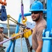 Navy Divers Repair USS Iwo Jima