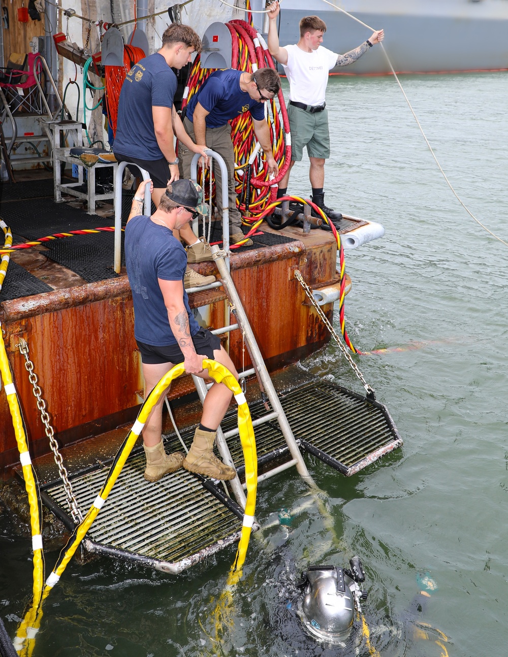 Navy Divers Repair USS Iwo Jima