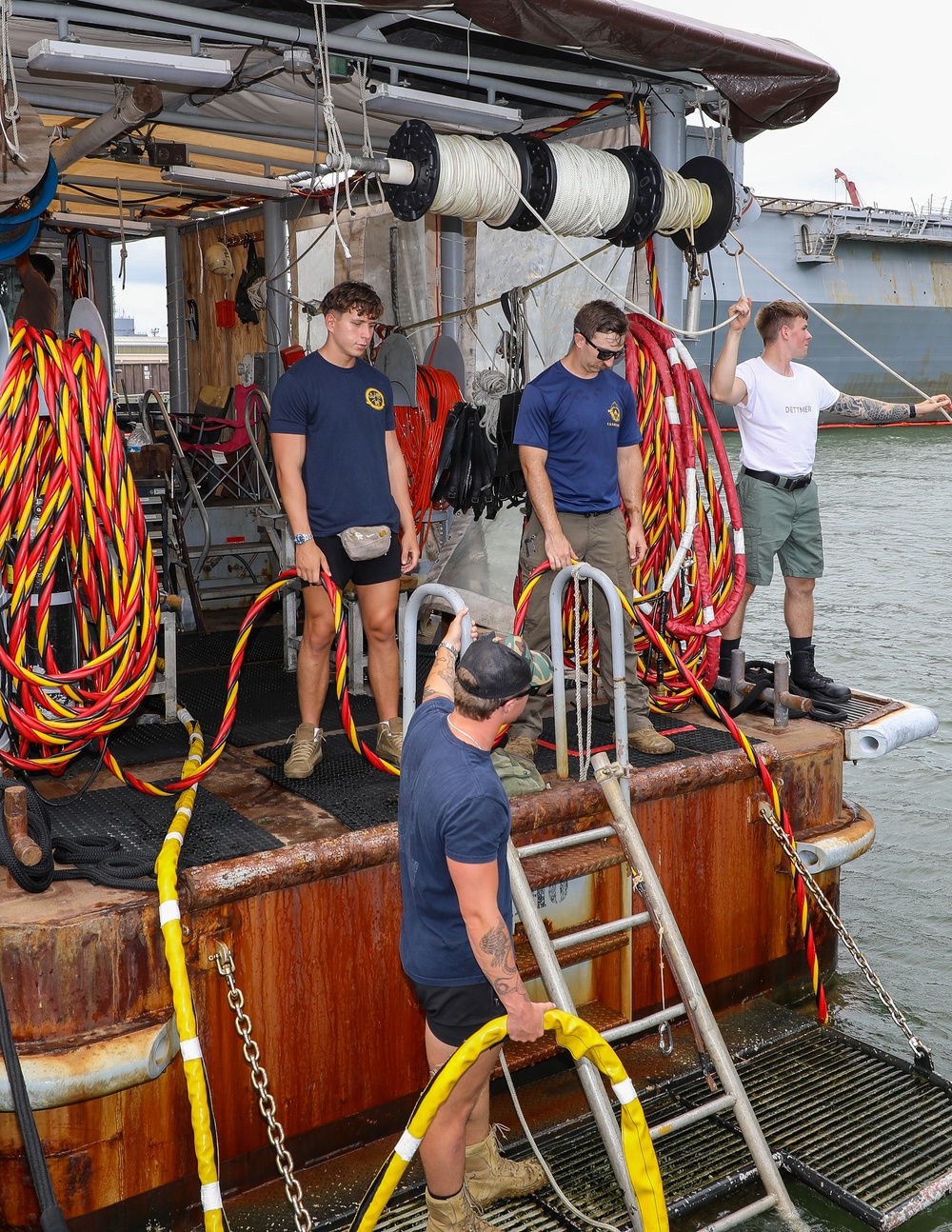 Navy Divers Repair USS Iwo Jima