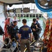 Navy Divers Repair USS Iwo Jima