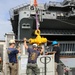 Navy Divers Repair USS Iwo Jima