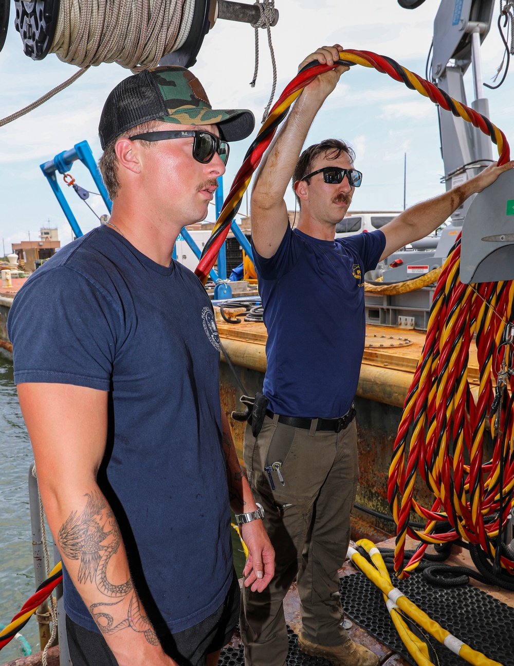 Navy Divers Repair USS Iwo Jima